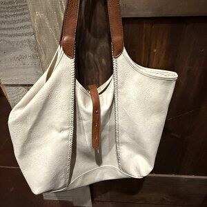 no brand name purse, white or cream color with brown trim